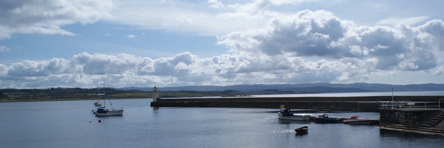 A yacht entering the Crinan Canal