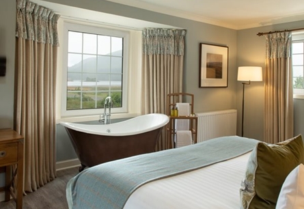 The Glencoe Inn bedroom with view from window too